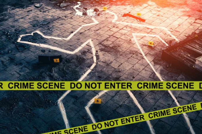 1478788715 Crime scene with chalk outline and evidence markers.