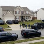 Child-Rescue Numbers Spark FBI Firestorm FBI agents conducting an operation in a suburban neighborhood