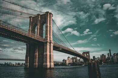 2684346583 Brooklyn Bridge spanning the East River under dramatic clouds