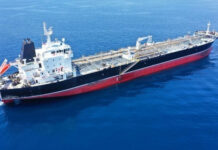 Tankers Hit — U.S. Strikes Slam Iran Oil tanker ship sailing on calm blue sea