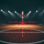 Madison Square Garden Leak Exposes Identity Scoring Machine An empty basketball court illuminated by dramatic lighting