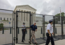 Trump Rally: Preventable? Investigators Say Yes Security officials at the Supreme Court gates.
