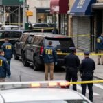 Wrong Van, Dead Man — Where’s The Video? FBI agents and police officers at a crime scene with police tape
