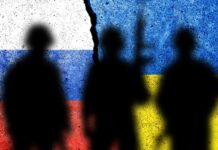 Silhouetted soldiers with Russian and Ukrainian flags background.